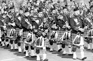 Bagpipes Prints: Pipers marching pas the Royal County Hotel in Durham during the Durham Miners Gala in