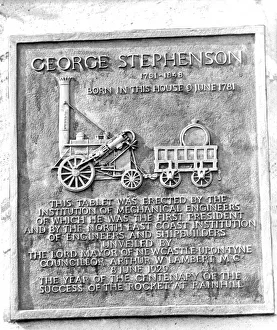 A plaque on George Stephensons Cottage at Wylam commemorating that he was the first