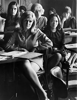 Playboy Club Bunnies School. Woman sitting learning how to become a bunny girl during a
