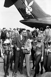 Magazine Prints: Playboy Editor and Publisher Hugh Hefner arrives at Heathrow Airport in his private