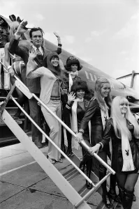 Playboy Editor and Publisher Hugh Hefner arrives at Heathrow Airport in his private