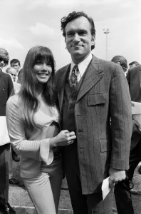 Playboy Editor and Publisher Hugh Hefner arrives at Heathrow Airport in his private
