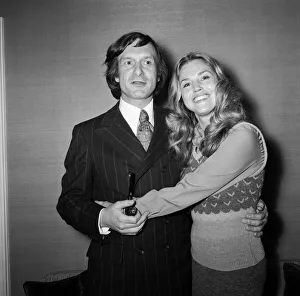 Magazine Prints: Playboy king Hugh Hefner pictured with his social secretary during a press conference