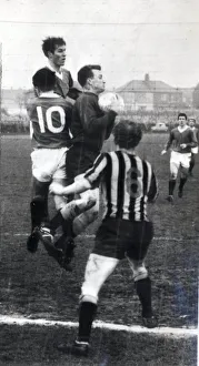 00270 Prints: Player manager Jock Wallace clears from mclean and forrest at Berwick circa 1965