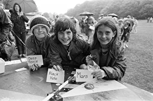 Day Out Prints: Playing the planet game'at a rain soaked Brighouse Fun Day were (from left