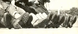 00172 Prints: Police cadets sitting down after a charity plod round the boundaries of Northumberland