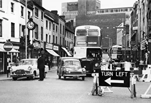 Police directing traffic coming down the Burges in Coventry city centre. 23rd July 1963