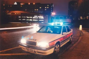 A police officer watches the traffic whizz by in his patrol car 01 / 06 / 95 circa