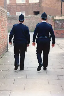 Policemen Prints: Two police officers patrol the streets on Newbiggin Hall in Newcastle