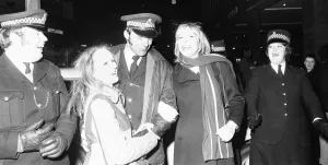 00753 Prints: Police share a joke and a kiss with New Year revellers in Broadgate 31st December 1971