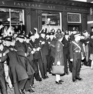 Police try to control fans in the streets of Liverpool before the premiere of the Beatles