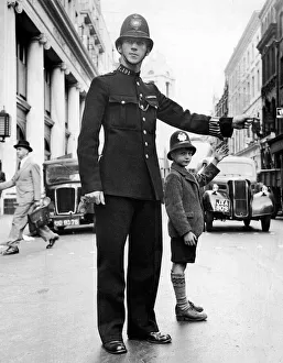 Signalman Prints: Policeman John Breeze on duty at the junction of Bow Street and Long Acre Road in London