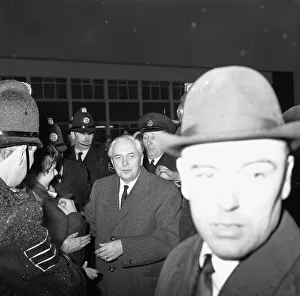 01071 Prints: Policemen hold back the crowds as Prime Minister Harold Wilson (1916 - 1995
