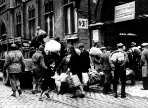 Survivors Prints: Polish civilians formerly used as slave labour by the Nazis in Belgium get aboard a truck