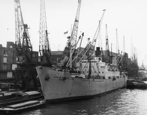 Barges Prints: The Polish Steamer Jaroslaw Dabrowski seen here unloading her cargo in the Pool of London