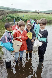 Pond dipping... pupils of Sheepridges Ashbrow Junior School (from left