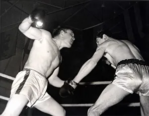 Pontypridd Boxer Len Rocky James - (left) in action against Carl Gizzi