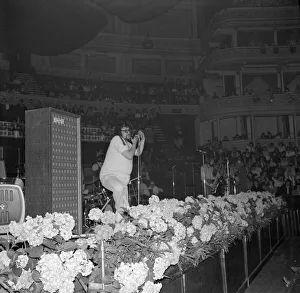 00077 Prints: Pop Concert at Albert Hall. Adrian Henri, poet and singer with