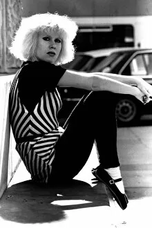 Images Dated 1st September 1980: Pop diva Hazel O Connor relaxes on the George Stephenson monument