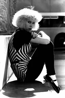 Images Dated 1st September 1980: Pop diva Hazel O Connor relaxes on the George Stephenson monument
