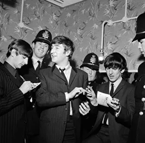 00442 Prints: Pop Group The Beatles November 1963 The Beatles sign autographs for birmingham