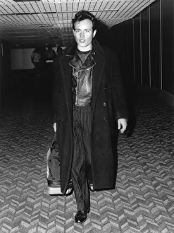 00325 Prints: Former pop idol Adam Ant flew home to Britian yesterday to make a comeback as a singer
