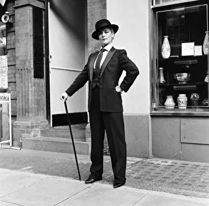 Pop singer and actress Toyah Willcox dressed as a city slicker