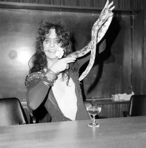 Pop singer Alice Cooper aged 23 flew into Heathrow Airport today with his pet boa