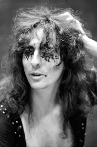 Pop singer Alice Cooper aged 23 flew into Heathrow Airport today with his pet boa
