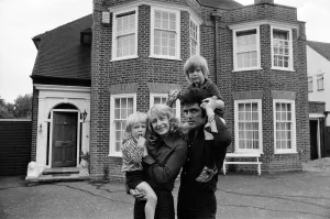 Pop singer Alvin Stardust at his new house in Stanmore with his family - wife Iris