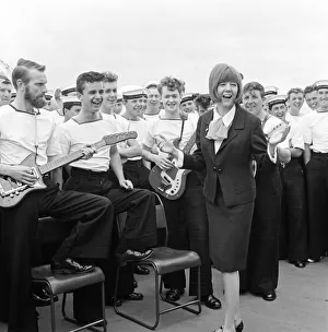 Pop singer Cilla Black visits the missile destroyer HMS London to open the closed circuit