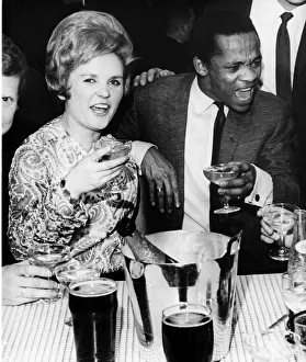 Toasting Prints: Pop singer Danny Williams Jan 1965 pictured in a Leeds night club with Cabaret artist