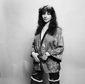 Pop singer Kate Bush poses in the studio wearing a kimono March 1978