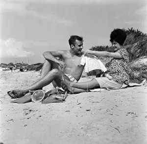 Pop singer Marty Wilde and his 19-year-old wife Joyce on the beach at Shell Bay, Dorset