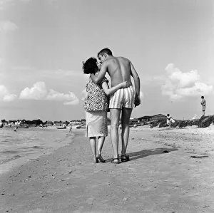 Pop singer Marty Wilde and his 19-year-old wife Joyce on the beach at Shell Bay, Dorset