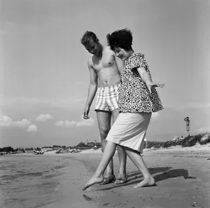 Pop singer Marty Wilde and his 19-year-old wife Joyce on the beach at Shell Bay, Dorset