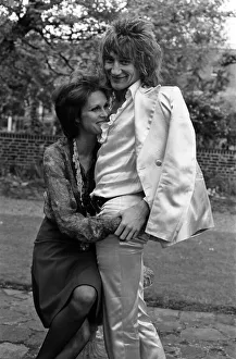 Pop singer Rod Stewart with his new girlfriend actress Joanna Lumley in her garden at her
