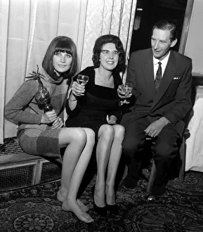 Pop singer Sandie Shaw holding the Mirror award for coming Number One in the Hit parade