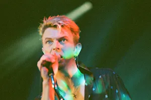 Pop star David Bowie performing on stage during a concert at The Barrowlands in Glasgow