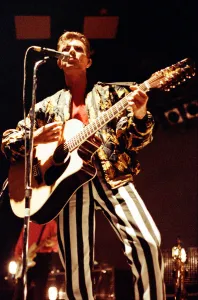 Pop star David Bowie performing on stage during a concert at the Barrowlands in Glasgow