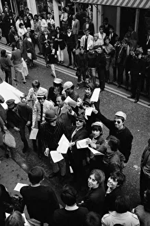 Pop stars meet in Carnaby Street, London to become founder members of an anti bowlerhat