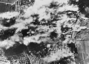 Italy Prints: The port and rail facilities at Rimini are blasted by bombs from flying Fortresses