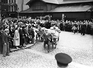 00966 Prints: Porters from Covent Garden Flower and Vegetable market race their carts around