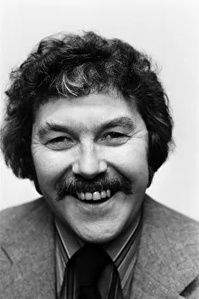 01022 Prints: Portrait of Dickie Davies, television sports commentator. February 1976