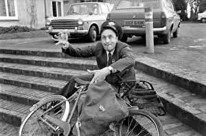 Postman Prints: Postman Trevor Bennett celebrating his good news with a glass of champagne