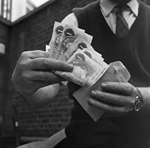 One Pound Notes in 1968. Pictures originally taken for a consumer