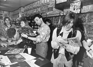 Prefab Sprout sign autographs for fans at the HMV music store in Newcastle