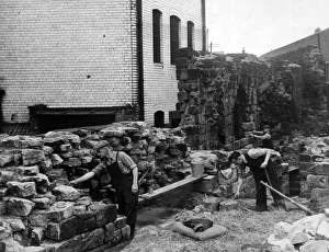 History Prints: Preservation on the old City Wall is being carried out by Newcastle Corporation workmen