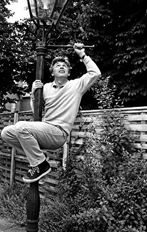 President of Bermondsey Boat Club Tommy Steele relaxes at his Thames side house