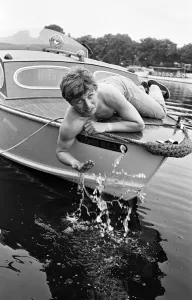 01163 Prints: President of Bermondsey Boat Club Tommy Steele relaxes at his Thames side house